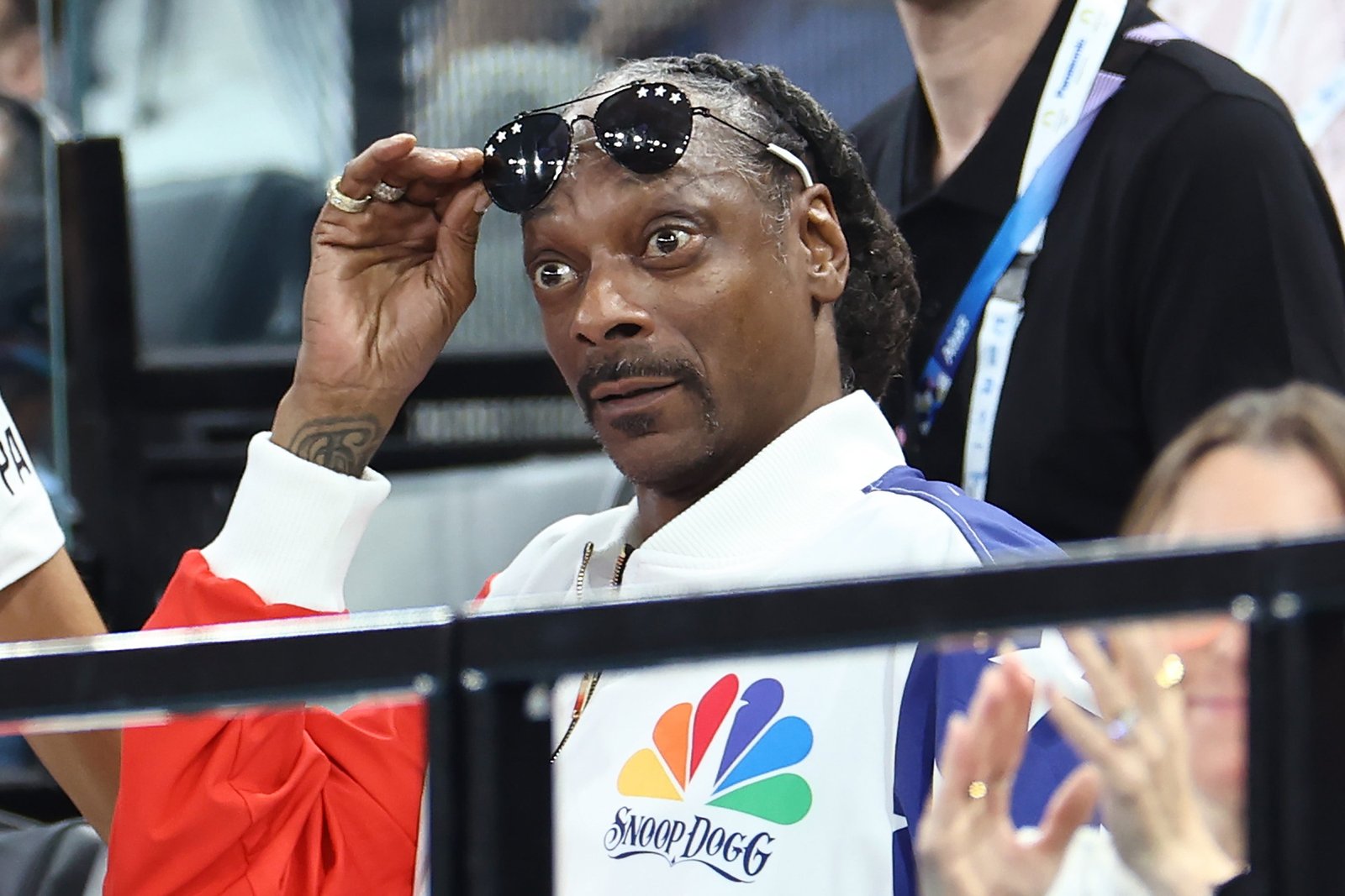 Snoop Dogg (R) attends a Women's Training Academy