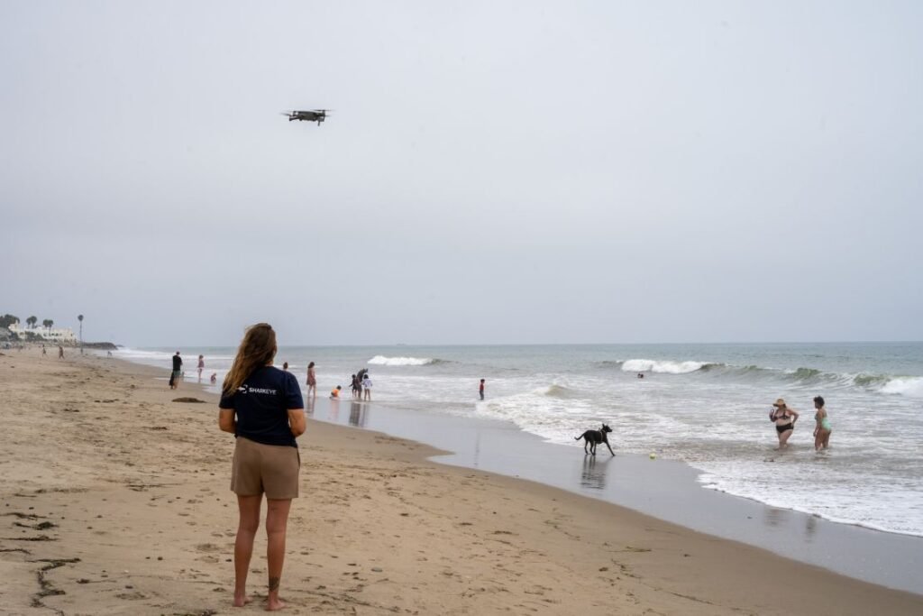 SharkEye pilot Samantha Mladjov on Padaro Beach, California.